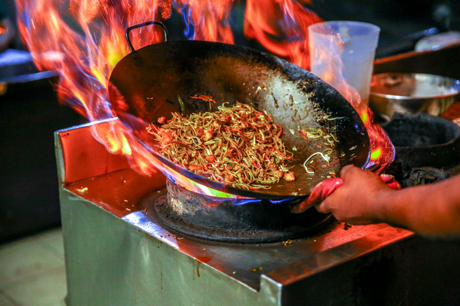Wok over a street-food flame
